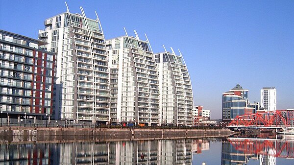High-rise apartments in Salford Quays during a summer morning