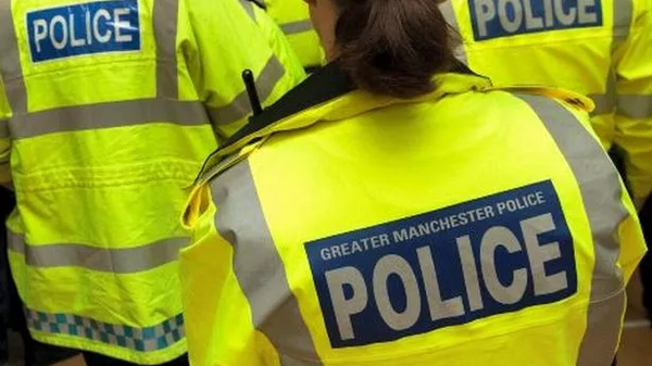 Image showing Greater Manchester Police officers wearing high-vis jackets