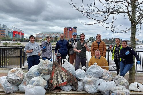 Members of the Salford Liberal Democrats and Salford Quays residents at our monthly Clean Up the Quays litter-pick.